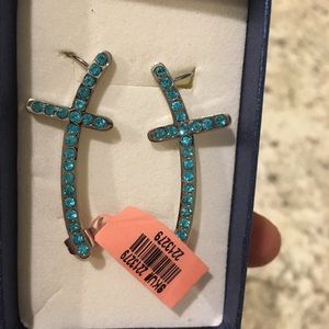 Stainless steel, lab made blue Topaz earring.